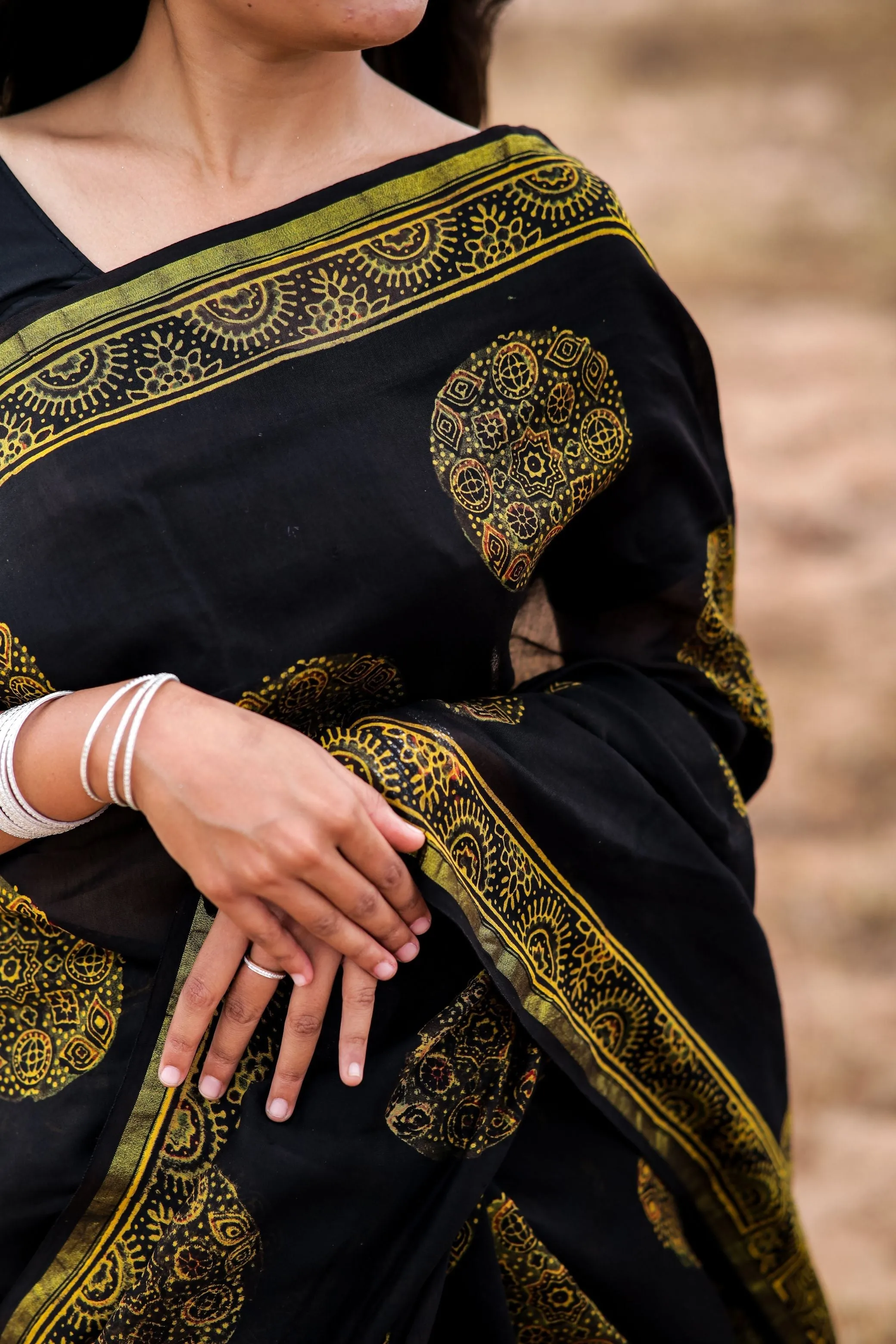 Jharokha -Black and green floral silk cotton Ajrakh handblockprinted saree